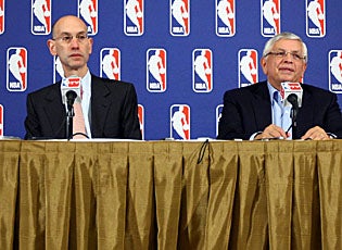 Deputy commissioner Adam Silver (left) and commissioner David Stern address questions after announcing the lockout. (Getty Images)