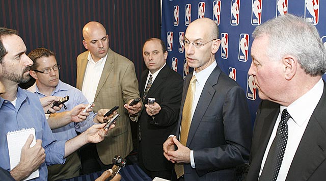 Forgive Ken Berger (second from left) if he seems unenthused about any future negotiations. (Getty Images)