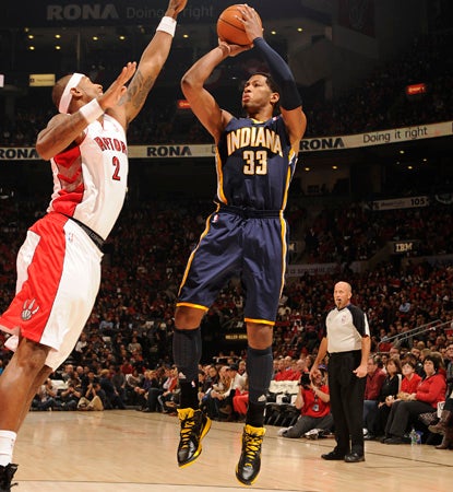 Danny Granger scores nine of his 21 points in the fourth quarter to spoil the home opener for the Raptors. (AP)