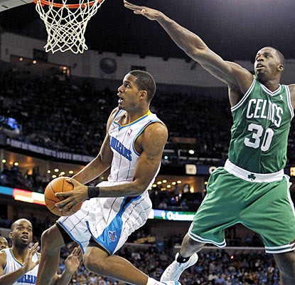 Trevor Ariza and the Hornets jump ahead of the Celtics early and never look back en route to a 19-point rout. (AP)