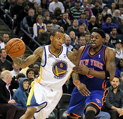 Monta Ellis (22 points, eight assists) and the Warriors use a dominant fourth quarter to push the Knicks aside. (Getty Images)