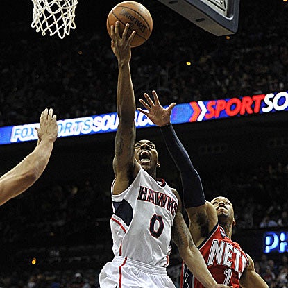 Jeff Teague pours in 22 points and collects six assists (both team highs) in Atlanta's win. (US Presswire)