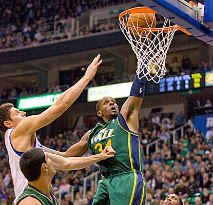 C.J. Miles comes off the bench to score 10 points as the Jazz get their first victory of the year. (US Presswire)