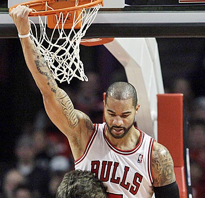 Chicago's Carlos Boozer gets hot early and winds up with 17 points and 11 rebounds.  (Getty Images)