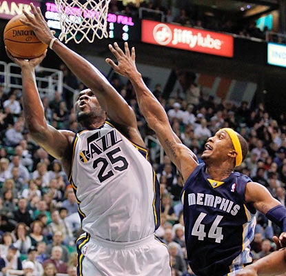 Al Jefferson leads the Jazz in scoring with 20 points and also finishes with a team-high nine rebounds in the win. (AP)
