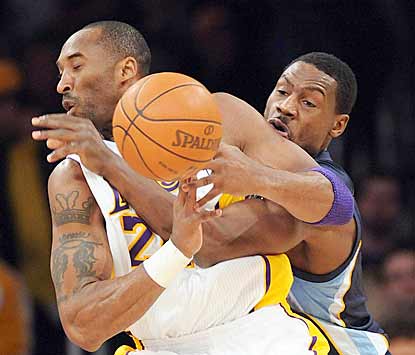 Rudy Gay pokes the ball away to force one of L.A.'s 27 turnovers, but Kobe Bryant (26 points) has the last laugh.  (US Presswire)