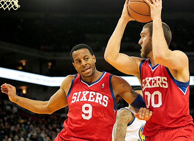 As Spencer Hawes pulls the rebounding load, Andre Iguodala is the one driving the Sixers. (US Presswire)