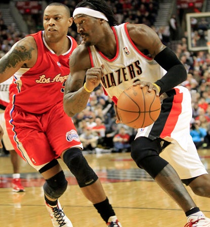 Gerald Wallace, who scores a team-high 20 points, steps up late with a crucial trey in the final two minutes of play. (AP)