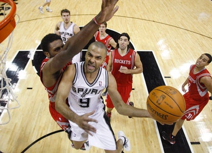 Tony Parker leads the Spurs in an OT win vs. the Rockets with 28 points, and four free throws late to ice it. (AP)