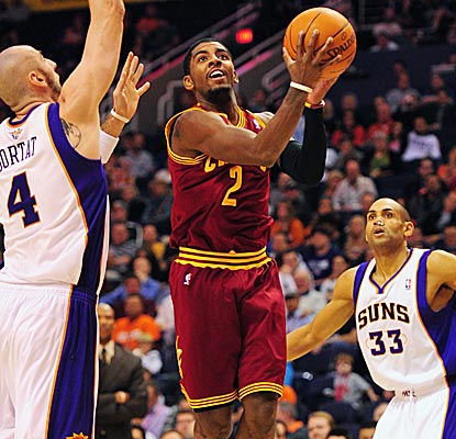 Cavs rookie Kyrie Irving proves himself against Steve Nash, scoring a career-high 26 points.  (US Presswire)