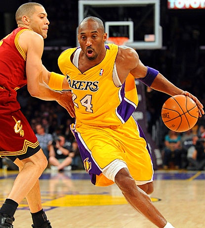Kobe Bryant drives to the basket early and often, scoring 42 points against the Cavaliers. (Getty Images)