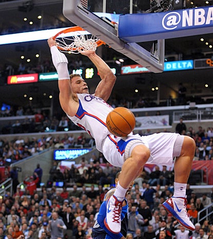 Blake Griffin slams home two of his 14 points to go along with his 17 rebounds against the Mavs. (US Presswire)