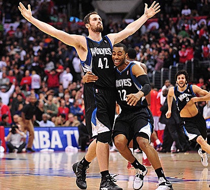 Kevin Love (42) connects for a game-winning 3-point basket as time expires to give the Timberwolves the victory. (US Presswire)