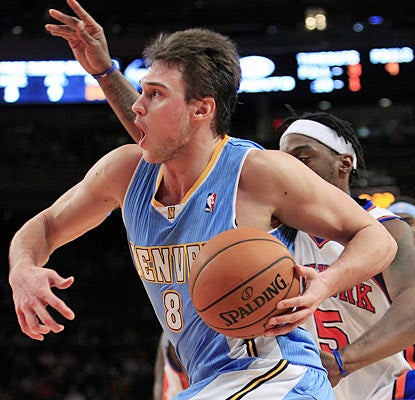 Danilo Gallinari fuels the Nuggets with a career-high 37 points against his former team in a double-overtime victory (AP)