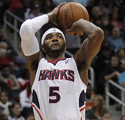 The Hawks' Josh Smith scores eight points and snags a game-high 11 rebounds in the win over the Cavs.  (US Presswire)