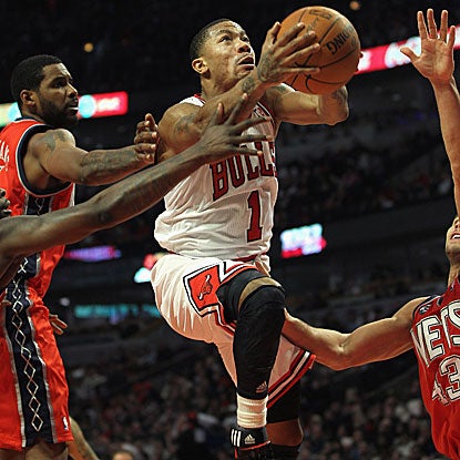 It's business as usual for Derrick Rose, who scores 22 points as he returns to action after missing four games. (Getty Images)
