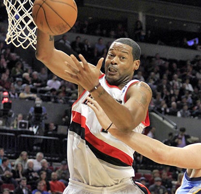 Veteran Marcus Camby shows off his rebounding ability by hauling in a season-high 22 boards in the win over Memphis. (AP)