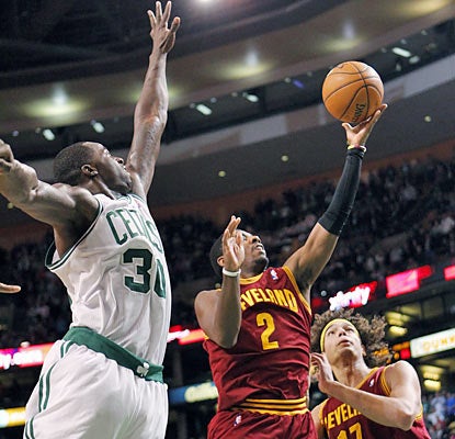 Kyrie Irving penetrates Boston's defense and lays in the winning shot with 2.6 seconds remaining in the fourth quarter. (AP)