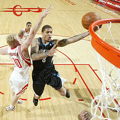 Michael Beasley scores 34 points to lift the Wolves over the Rockets in Rick Adelman's return to Houston.  (AP)