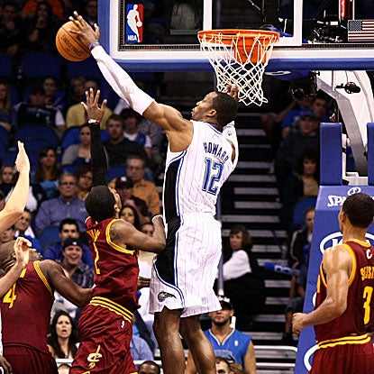 Dwight Howard blocks eight shots and grabs 16 rebounds (both game highs) in the Magic's win.  (US Presswire)