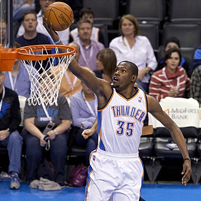 Kevin Durant scores the game's final seven points to push the Thunder past the Grizzlies.  (US Presswire)