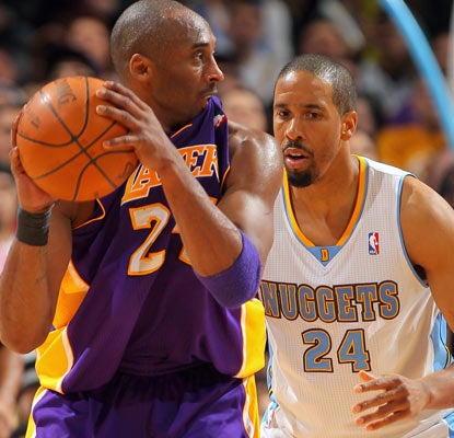 Kobe Bryant (20 points) and the Lakers notch a rare road win by slipping past Andre Miller and the Nuggets.  (Getty Images)