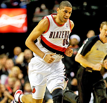 Nicolas Batum smiles after drilling one of his nine 3-pointers to set a new Trail Blazers record. (US Presswire)