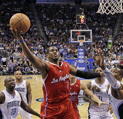 Chris Paul, who provides 29 points, hurts the Magic with 11 coming in the fourth quarter and overtime. (AP)