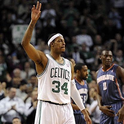 Paul Pierce acknowledges the home crowd after passing Larry Bird for No. 2 in Celtics scoring.  (US Presswire)