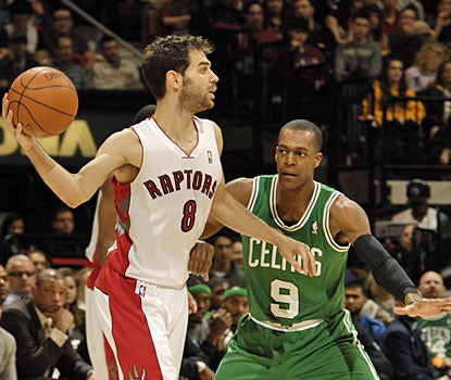 Jose Calderon comes up with a good outing for Toronto, scoring 17 and collecting 14 assists. (Getty Images)