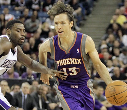 Steve Nash does most of his damage finding open teammates as he finishes with 15 assists in the win. (AP)