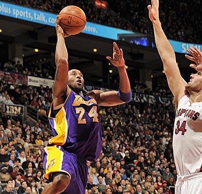 Kobe is big down the stretch, hitting a baseline jumper with 4.2 seconds left as the Lakers squeak past the Raptors.  (Getty Images)