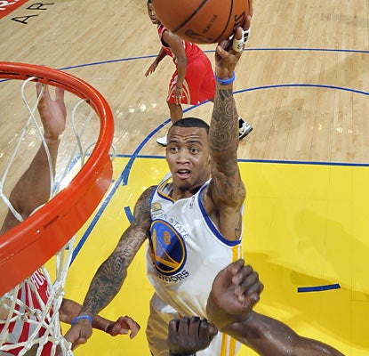 The Warriors get a big boost from Monta Ellis, who provides 33 points, five rebounds and seven assists against the Rockets. (Getty Images)