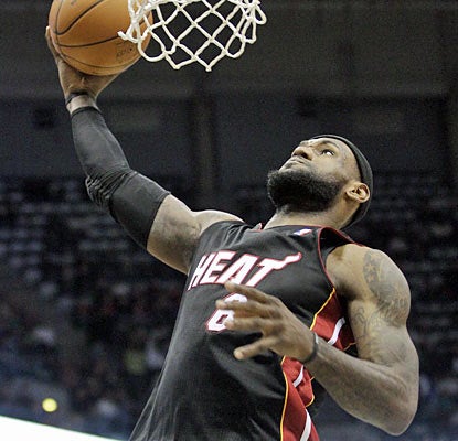 LeBron James, who scores 16 of his 35 points in the third, makes sure the Bucks don't improve to 3-0 against the Heat. (AP)