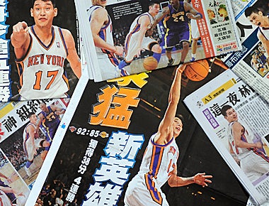 Lin is splashed across the front pages of daily papers in Taipei, the central city of Taiwan. (Getty Images)