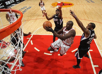 Bulls forward Luol Deng steps up without Derrick Rose in the lineup to score 23 points and add a career-high 11 assists. (Getty Images)