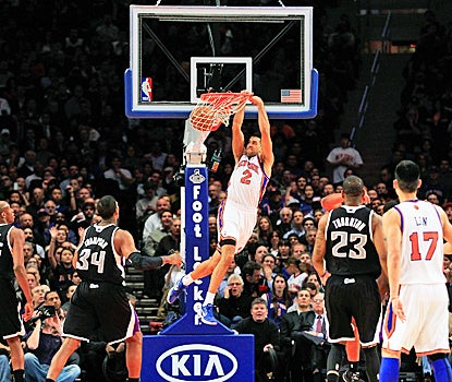 New York's Landry Fields slams home two of his team-high 15 points against the Kings. (Getty Images)