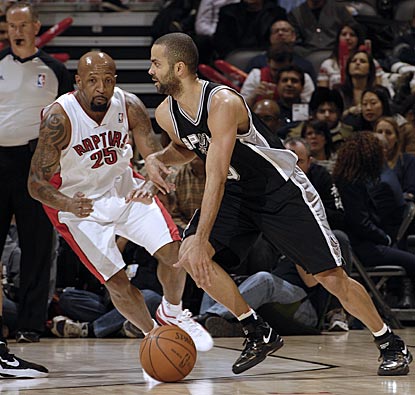 Anthony Carter tries to keep up with Tony Parker, who runs circles around the Raptors with 34 points and 14 assists.  (Getty Images)