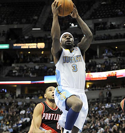 Ty Lawson soars to the hoop during the fourth quarter. He scores 18 points after a two-game absence due to an ankle injury.  (US Presswire)
