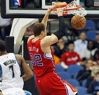 Blake Griffin dunks one on the Timberwolves as he helps the Clippers with 19 points and 13 boards. (AP)