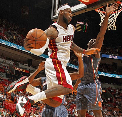 LeBron James narrowly misses a double-double with 19 points and nine rebounds as the Heat cruise.  (Getty Images)