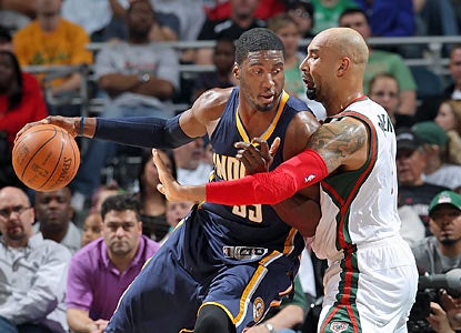 The Bucks struggle to slow down Roy Hibbert. The Pacers' big man finishes with 23 points and 14 boards. (Getty Images)