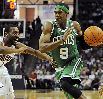 Without the Big Three, Rondo leads the Celtics to victory with 20 points and 16 assists.  (US Presswire)