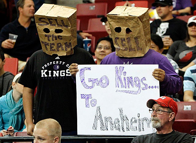 Fans protesting the Maloofs' recent moves were scattered throughout Sunday's game crowd. (AP)