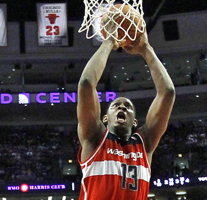 Washington's Kevin Seraphin provides team highs with 21 points and 13 boards in 43 minutes of work. (AP)