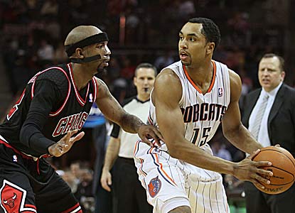 Rip Hamilton (22 points in 24 minutes) helps on defense as Chicago moves closer to locking up the East's No. 1 seed. (US Presswire)