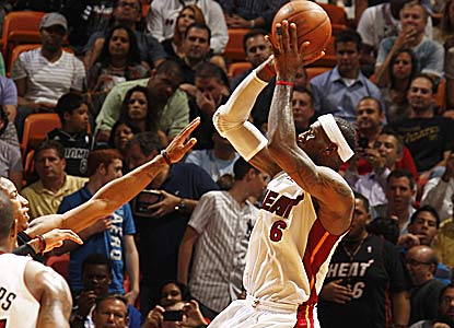 LeBron James, who takes the fourth quarter off, scores 28 as Miami holds Toronto to 23 second-half points. (Getty Images)