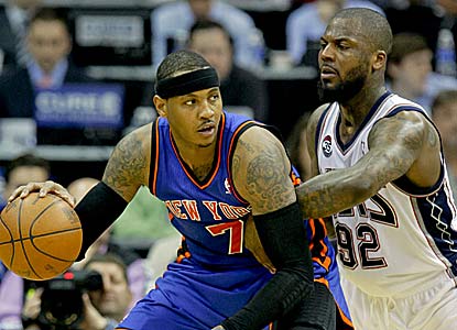 Carmelo Anthony finishes with 33 points -- including 21 in the opening quarter -- on the Nets. (US Presswire)