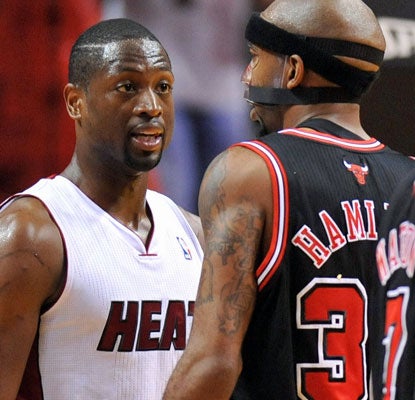 Dwyane Wade and Richard Hamilton exchange words in a tense, physical game between the top two teams in the East.  (U-Wire)