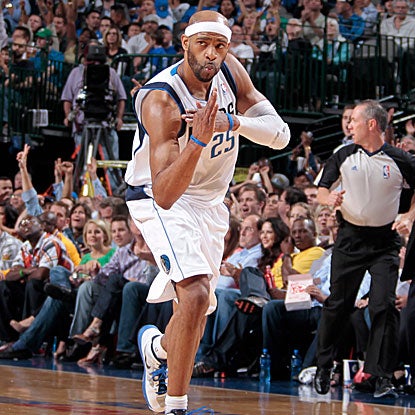 Vince Carter's eight consecutive points in the fourth quarter, and 19 overall, help lift the Mavericks over the Warriors.  (Getty Images)